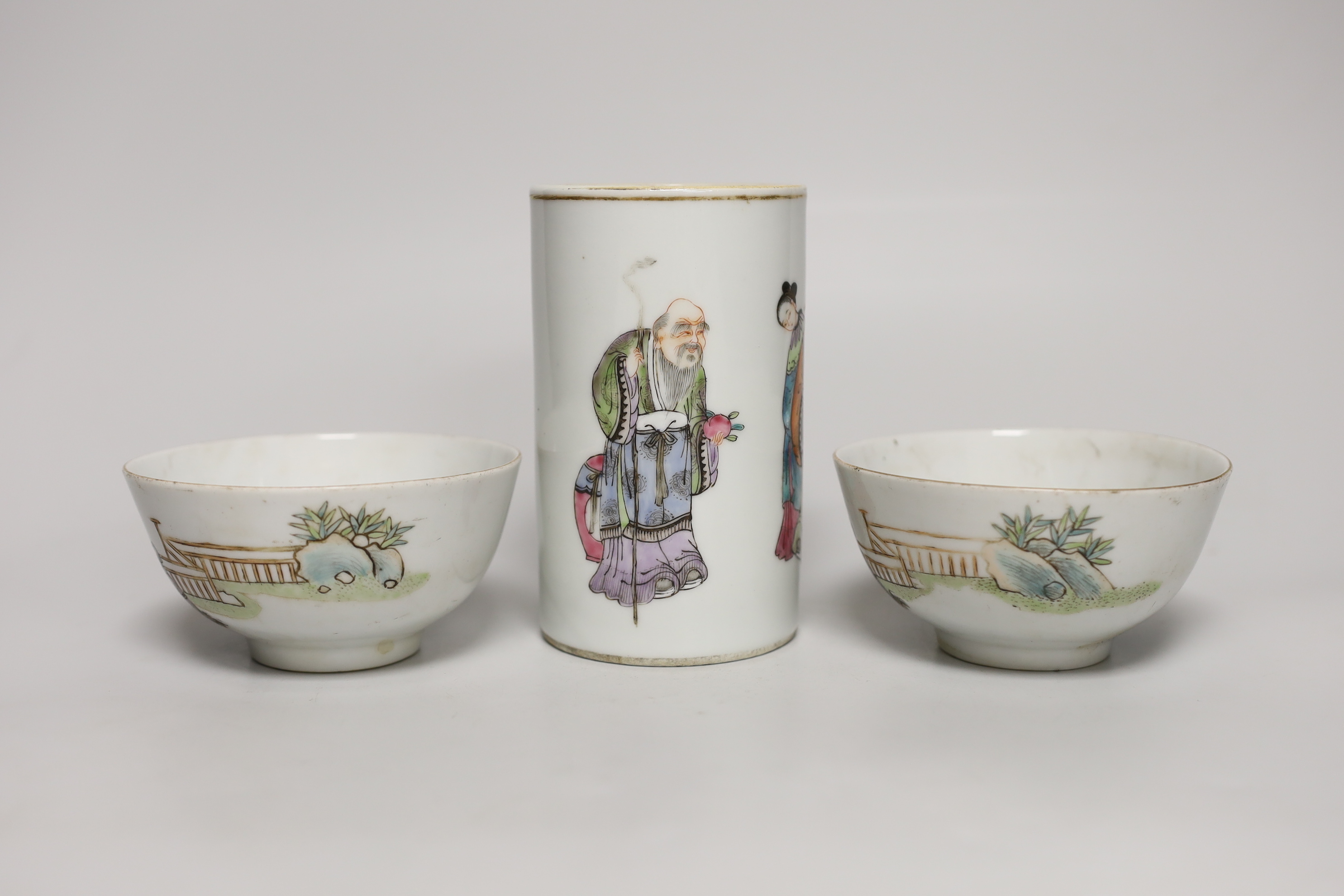A Chinese famille rose spill vase and a pair of rice bowls, spill vase 12.5cm high